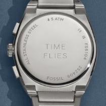 The engravable caseback on a silver-tone watch.