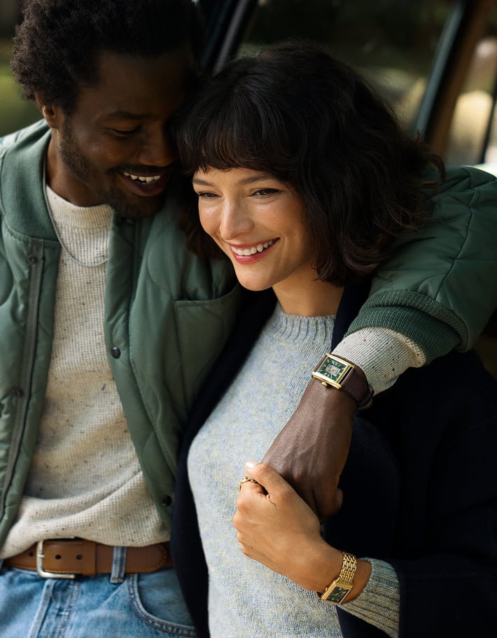 An artfully arranged stack of men's watches...