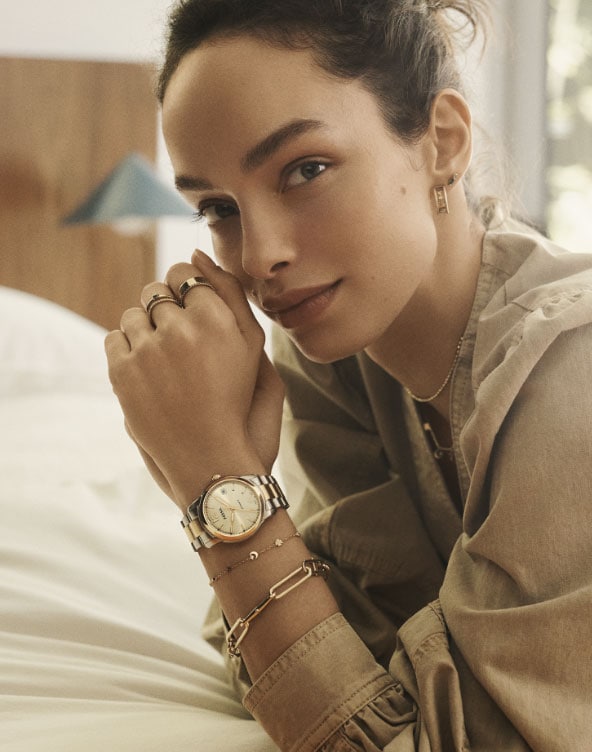 A woman wearing the Fossil Heritage Automatic Two-Tone Stainless Steel Watch