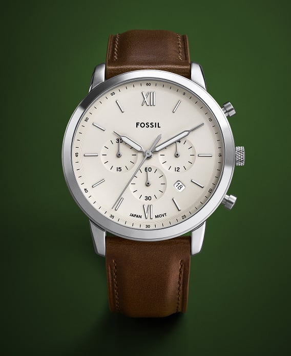 The classic Fossil Neutra watch, featuring a cream-coloured dial and brown leather strap.