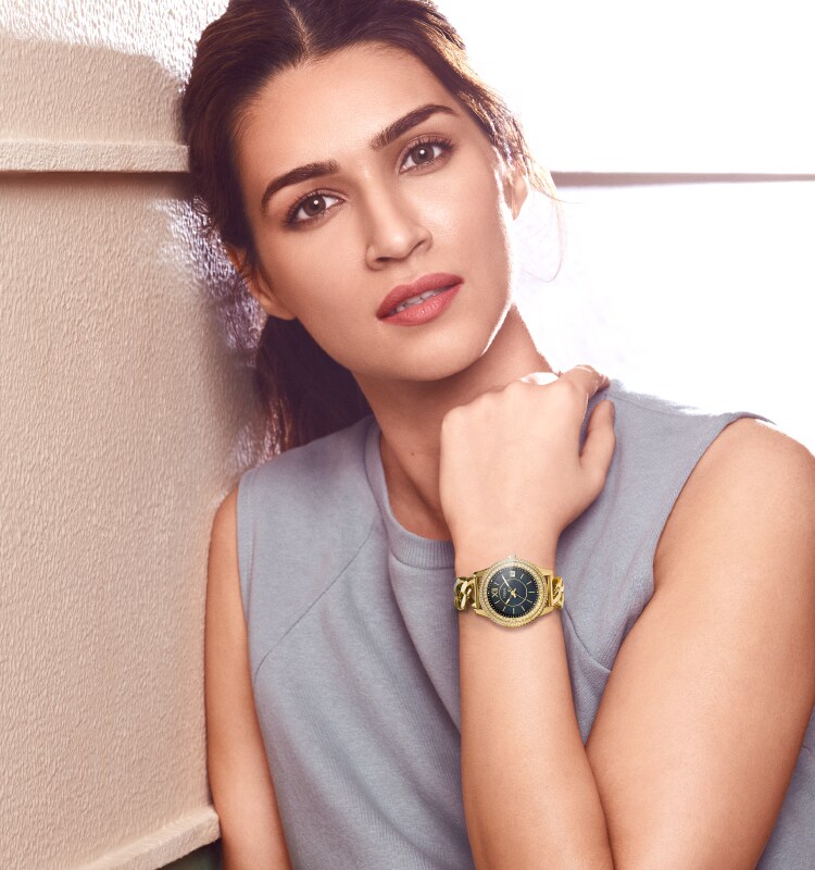 Female model wearing a watch.