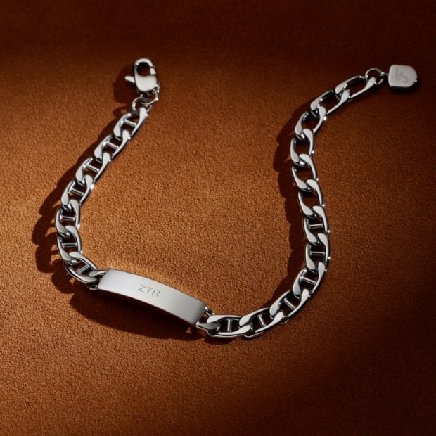 Silver-tone engravable jewellery.