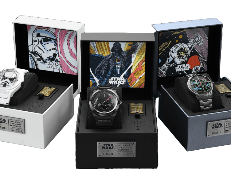 The stormtrooper, Darth Vader and TIE fighter watches displayed in their boxes