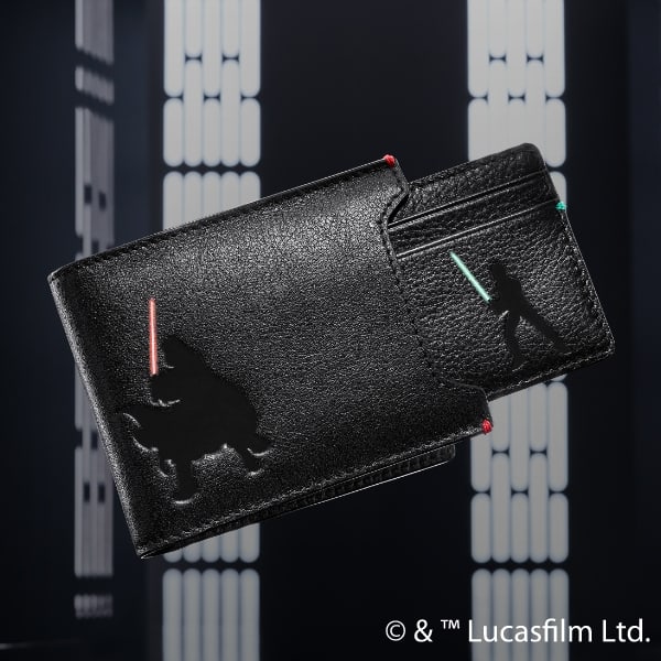 A black slide-out wallet with embossings of Luke and Darth Vader 