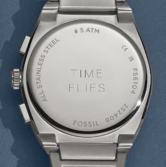 The engravable caseback on a silver-tone watch.