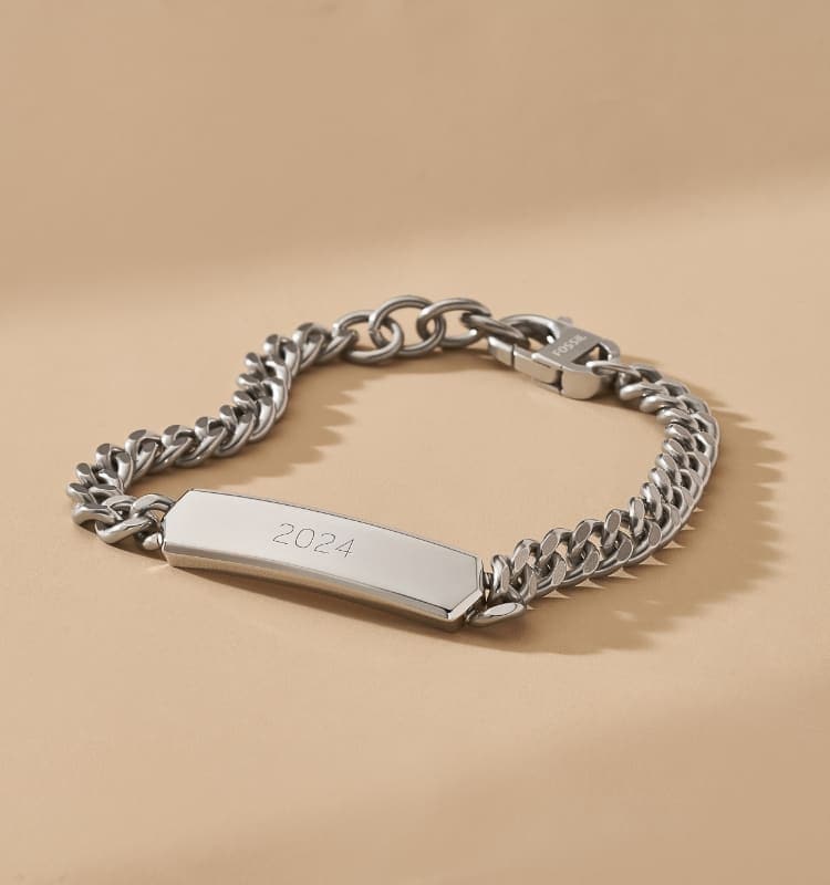 A chain ID bracelet engraved with the year 2024.
