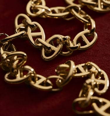 Gold-tone Fossil Heritage jewelry.