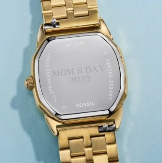 The engravable caseback on a gold-tone watch.