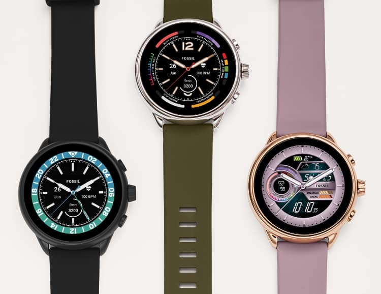 Three Fossil watch faces: Wellness Gauge, Heritage GMT and Heritage Wellness.