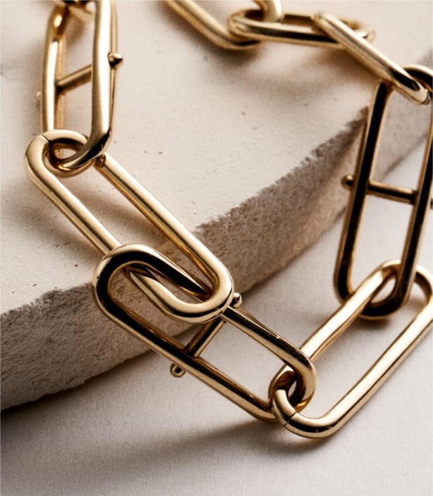 A closeup of the gold-tone D-Link collection.