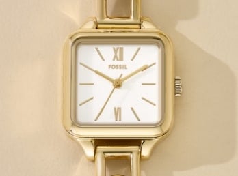 A gold-tone women's watch with a square case.