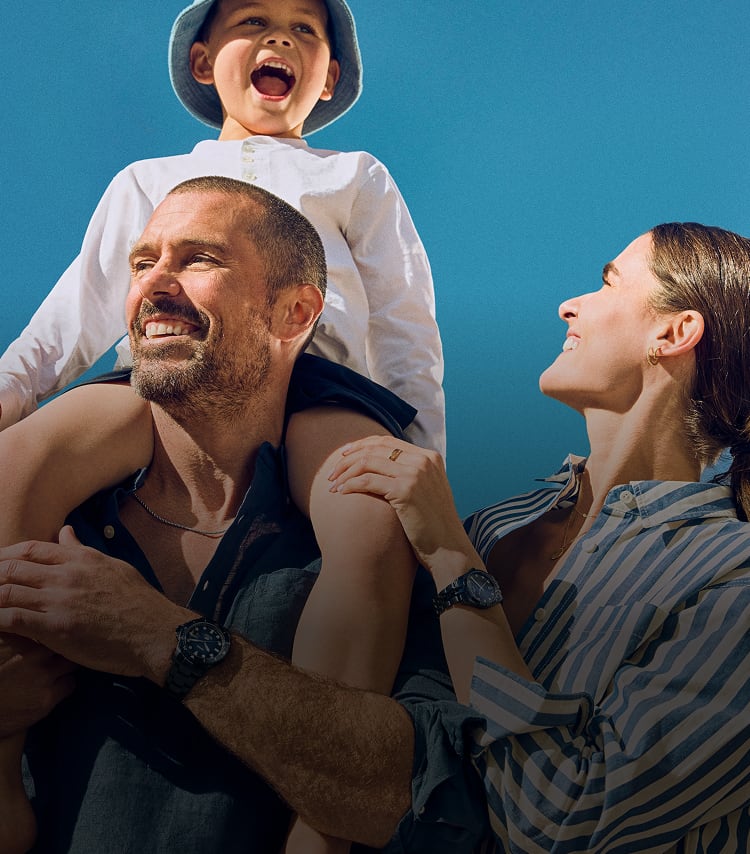 A man, woman, and child.