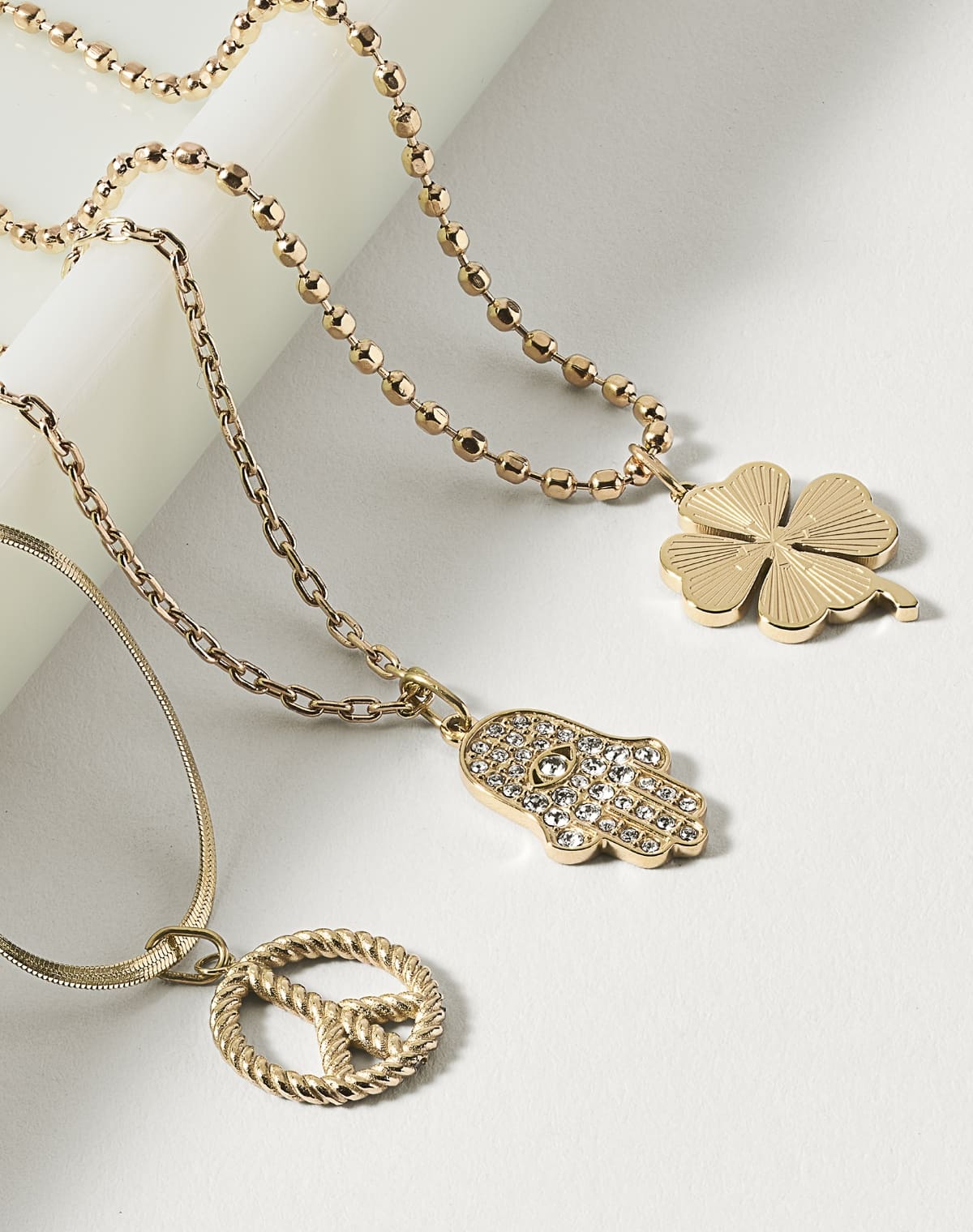 Three golden charms.