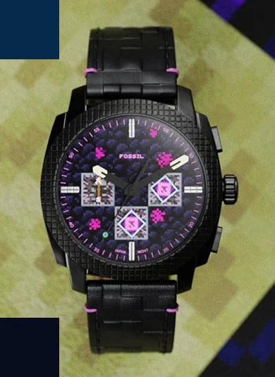 Die Uhr The End Minecraft x Fossil liegt auf der Seite auf einem Würfel vor einer pixeligen Welt.