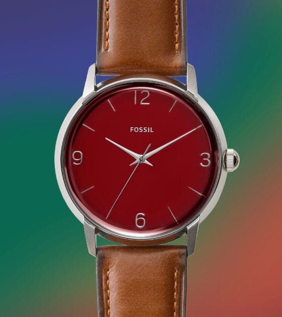 Die Limited Edition Uhr Mood mit farbigem Hintergrund und verschiedenen Emojis.
