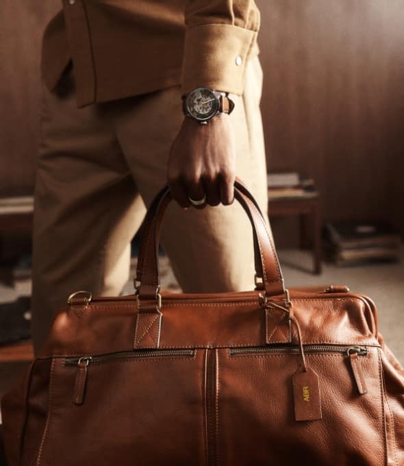 The brown leather Defender duffel.