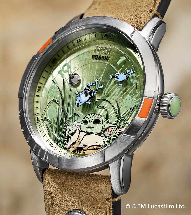 The Fossil limited-edition Mandalorian and Grogu watches, shown in their collectible display boxes