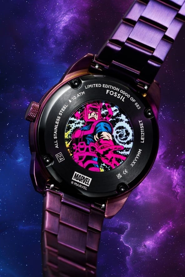 Blurred view of a round oversized watch silhouette on a glowing purple intergalactic background.