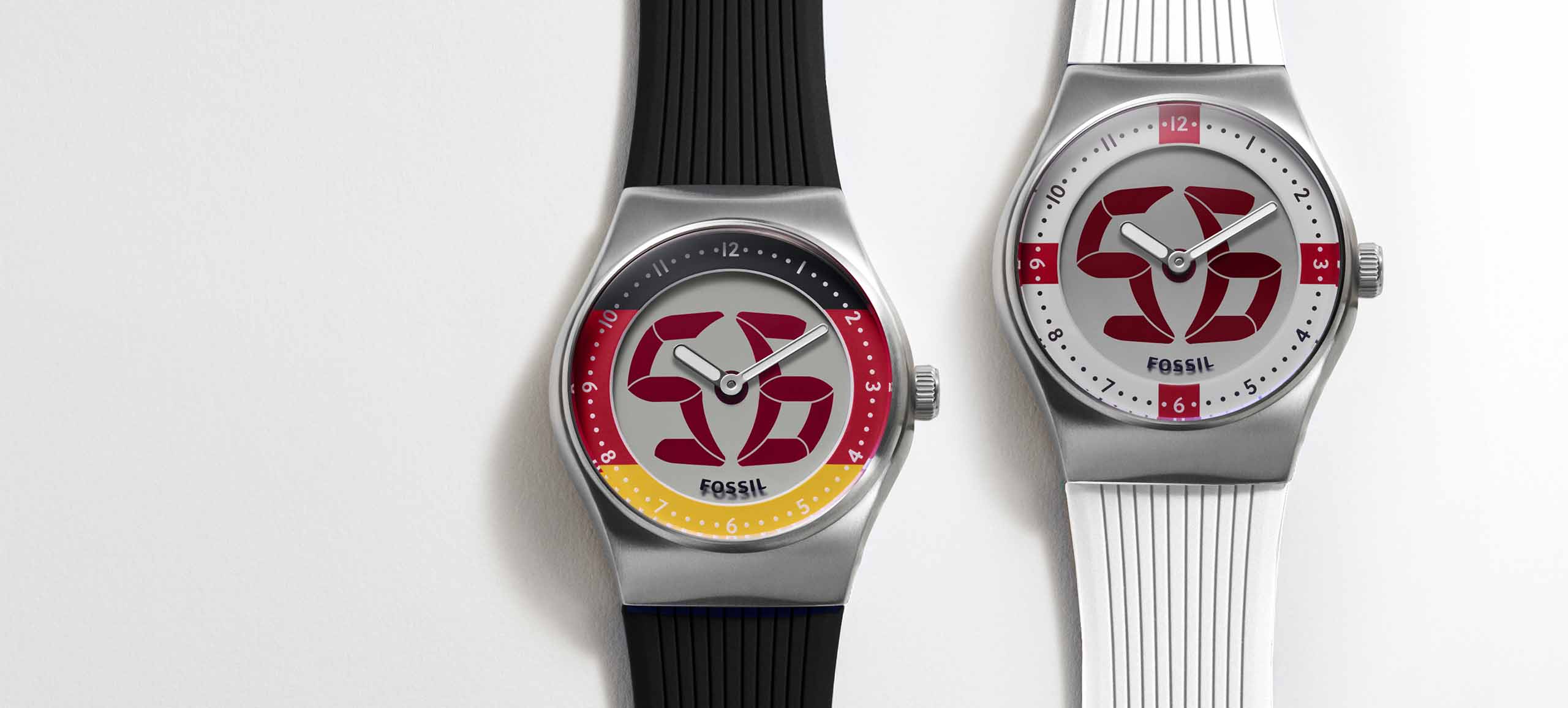 Zwei World Flags Big Tic Fossil Uhren nebeneinander