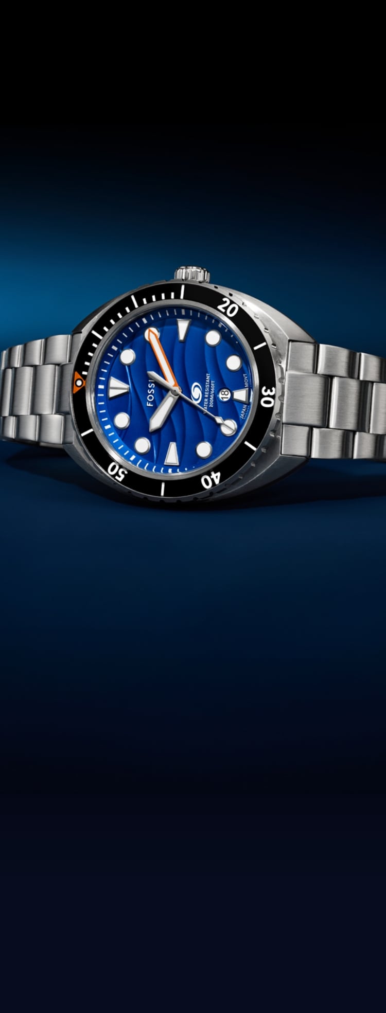 The stainless steel Breaker Dive watch with a blue dial surrounded by bubbles of water.