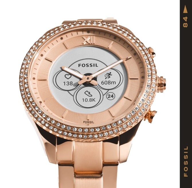 Une montre hybride pour femmes Gen 6 ton or rose.