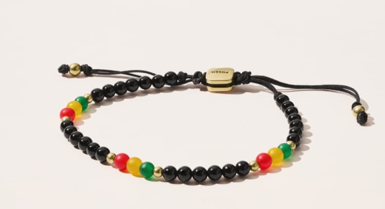 Our exclusive bracelet for Black History Month, featuring red, yellow and green dyed jade beads mixed with genuine black onyx beads on a nylon cord.