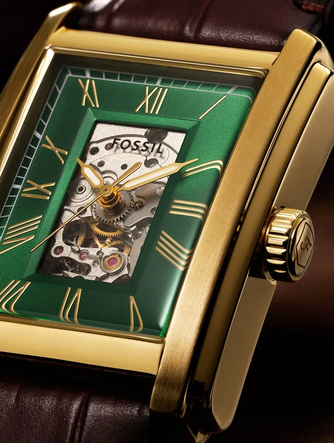 The architectural Carraway automatic watch featuring a skeletonized dial framed in lustrous green.