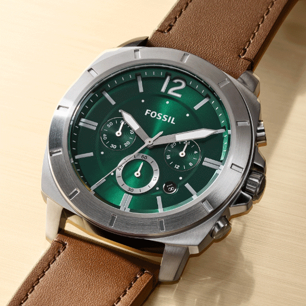 A gif image. The first image shows the Privateer classic men’s watch, featuring a lustrous green dial and brown leather strap. The second image shows the women’s Colleen watch with a gold-tone finish, square-shaped case and black pearlescent dial accented by a crystal topring.