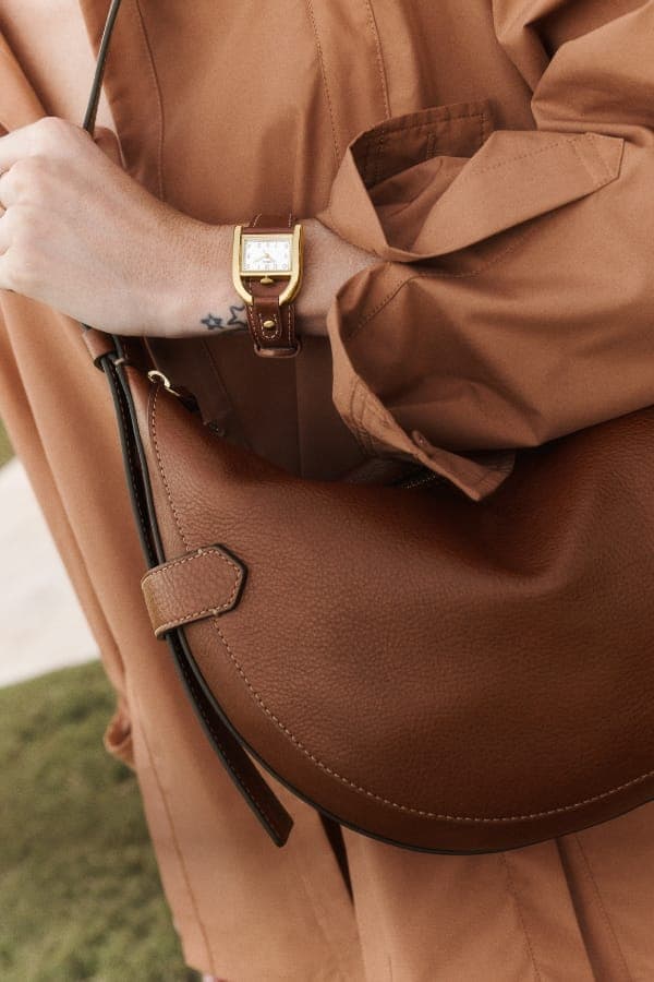 The brown leather Harwell watch and brown leather Harwell bag. 