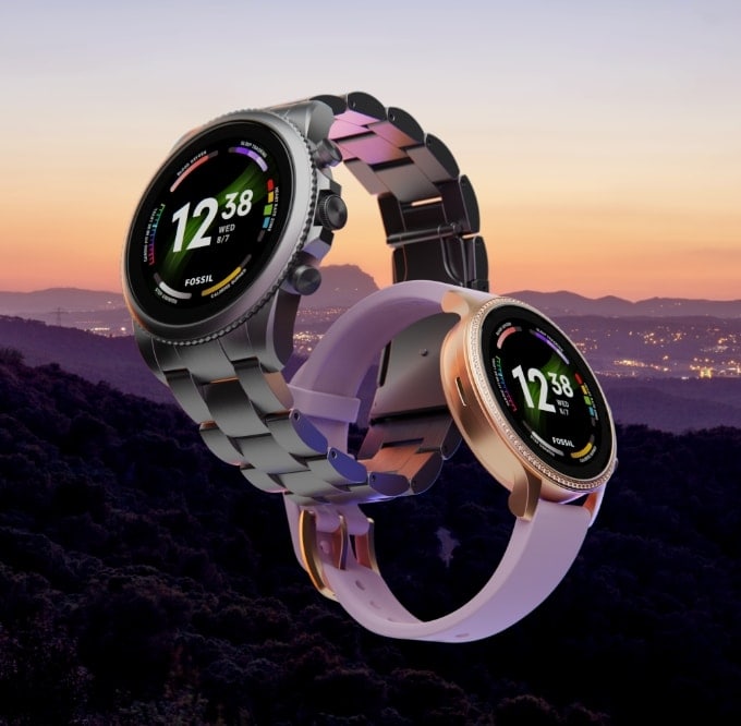 Deux montres intelligentes Gen 6, une en silicone noir et une en silicone lilas.