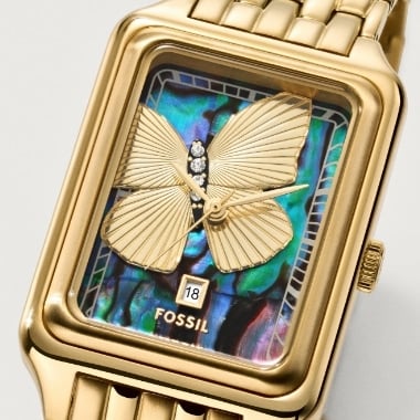 A gold-tone Harlow watch.