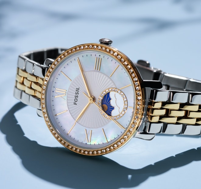 A gold-tone Celestial watch.