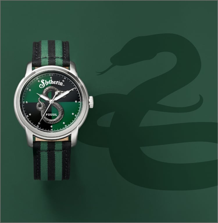 Silver-tone Slytherin house watch with a green and black strap.