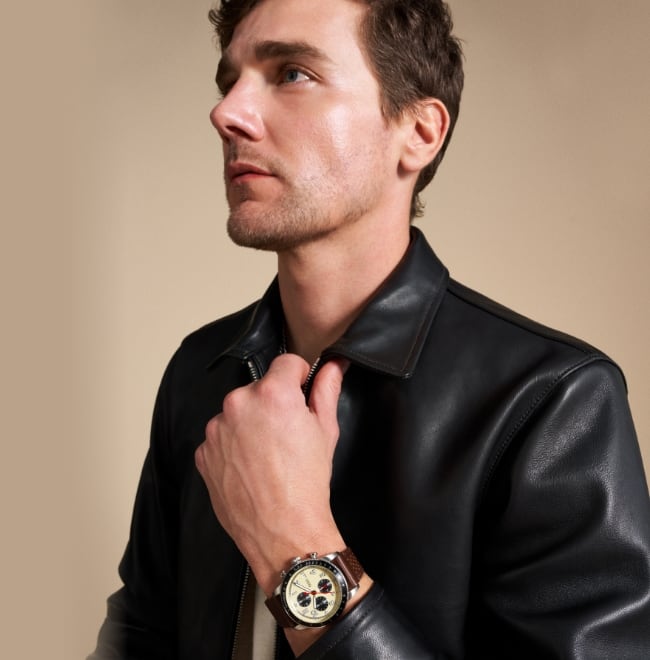 A man in a leather jacket wearing the brown leather Sport Tourer watch.