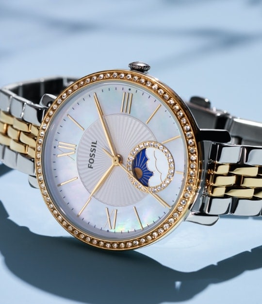 A gold-tone Celestial watch.