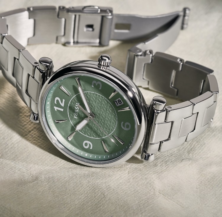 A stainless steel Carlie watch with green dial