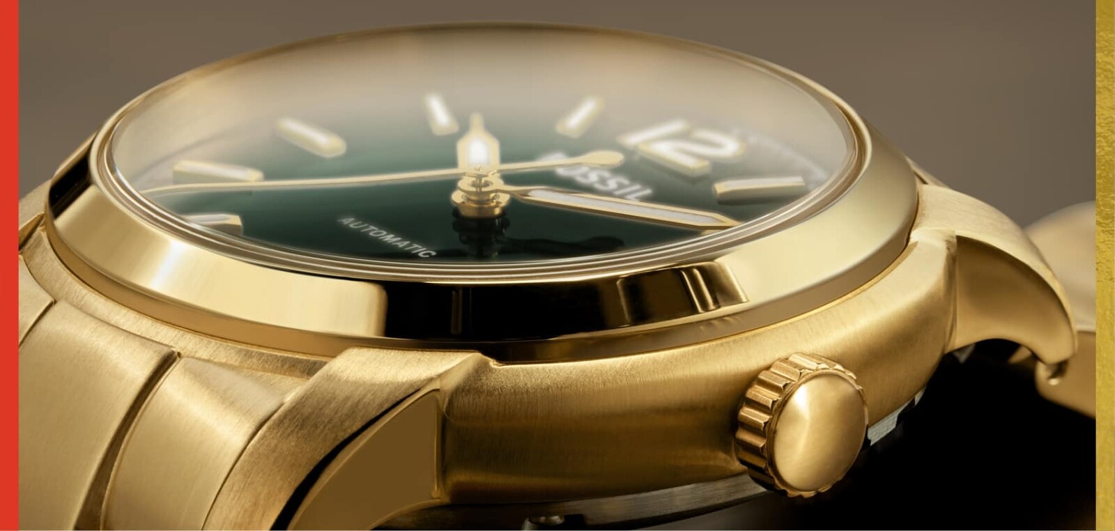 A close-up of a woman’s Fossil Heritage watch with a green dial.