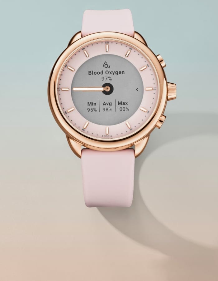 Une montre connectée hybride Gen 6 édition Wellness en silicone rose.