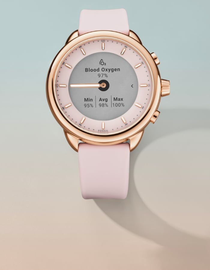 Une montre intelligente hybride Gen 6 Wellness Edition en silicone rose.