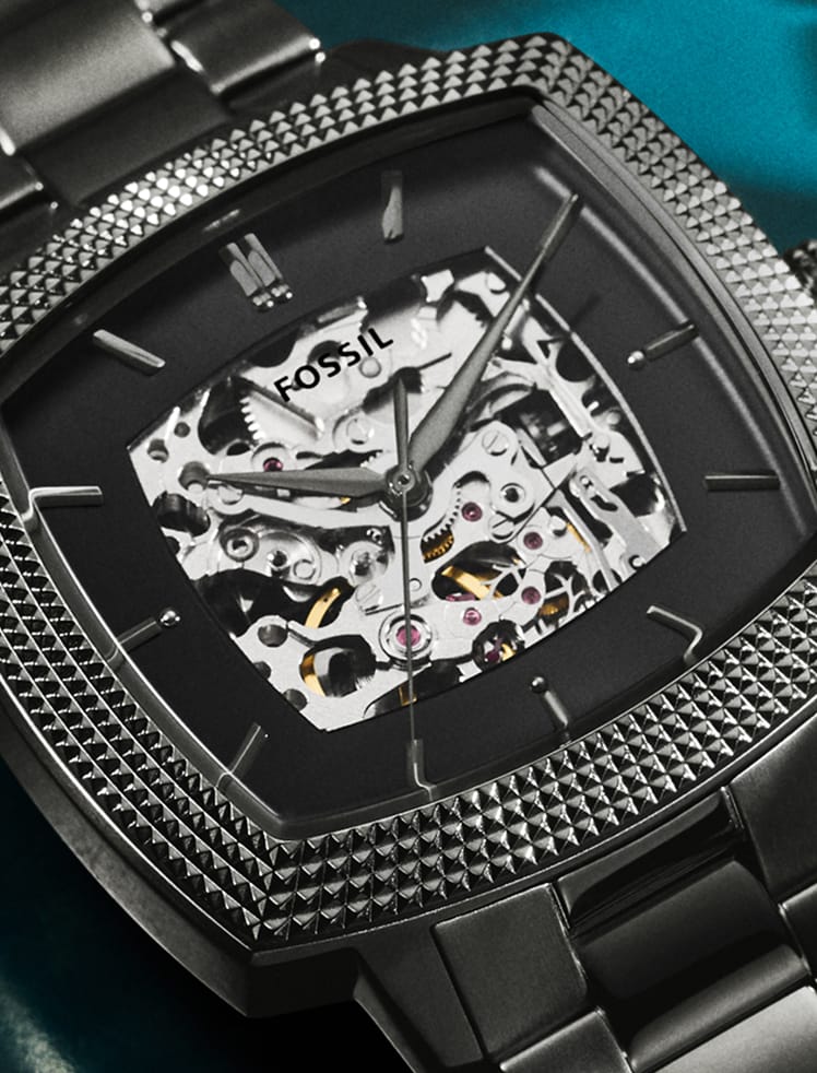 A close-up of two Machine Luxe automatic watches.