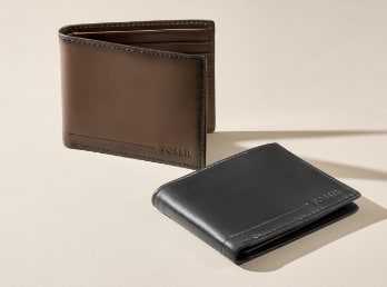 Two men's wallets in brown and black leather.