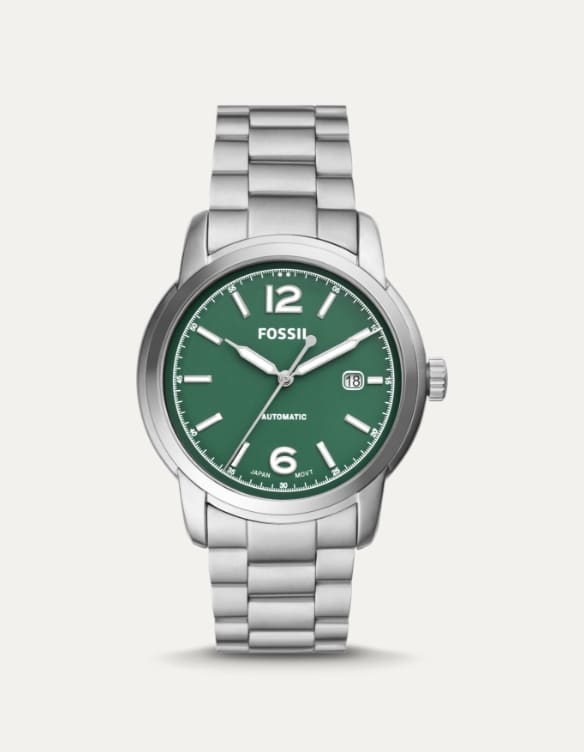 Stainless steel Fossil watch with a green face.