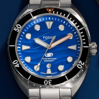 Stainless steel Breaker Dive watch with a blue dial.
