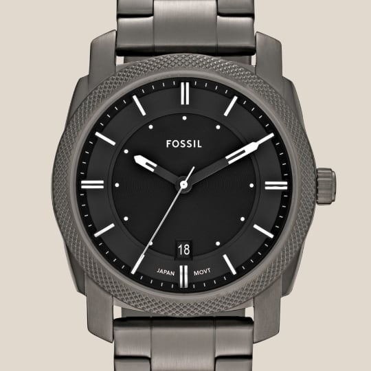 Stainless steel Machine watch with black dial.