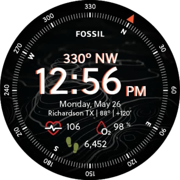 Un cadran de montre boussole Fossil.