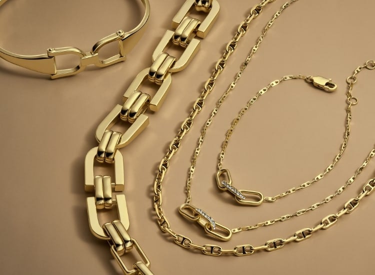 Gold-tone Fossil Heritage necklaces and bracelets. 