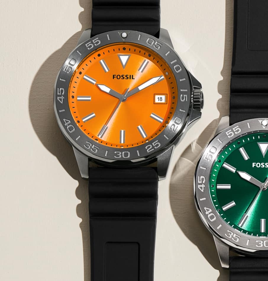 Men’s sporty watches with a black strap and colourful dials in orange, green, red, yellow and blue.