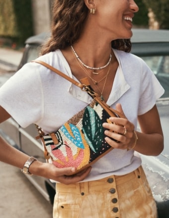 woman with beaded handbag