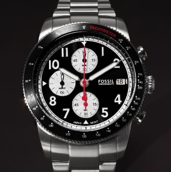 A silver-tone Sport Tourer watch with black dial. 
