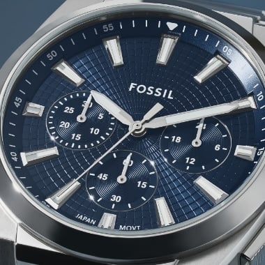 A silver-tone Machine watch.